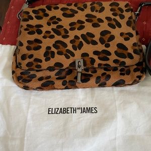 Animal hair cross body bag.